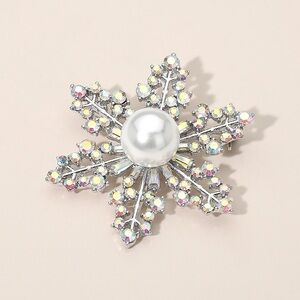 Elegant Silver Snowflake Brooch with Pearl Center